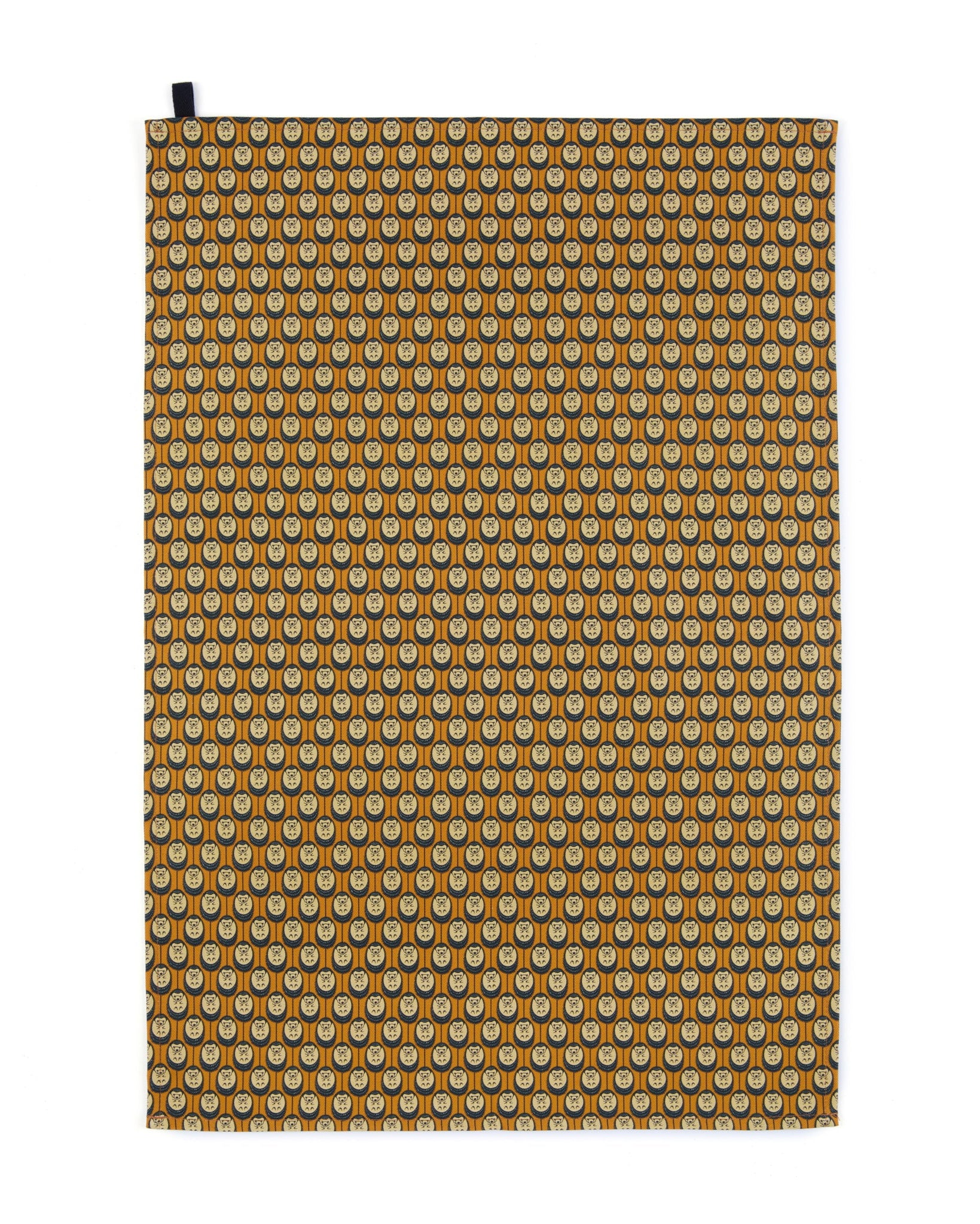Organic cotton autumn hedgehog tea towel – burnt orange background, handmade in the UK by Hannah Issi. Stylish, sustainable linen. Cut-out image.