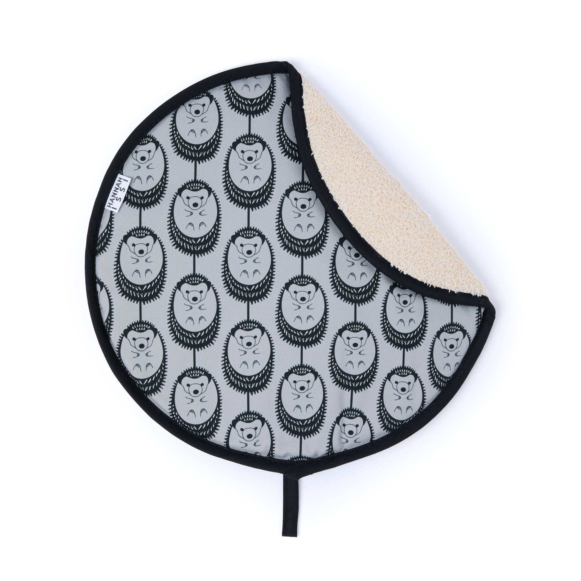 Organic cotton grey hedgehog AGA cover – handmade in the UK by Hannah Issi. Decorative, sustainable kitchen textile. Cut-out image showing towelling reverse on white background .