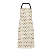 Organic cotton bee apron – designed by Hannah Issi and handmade in the UK. Stylish, sustainable kitchen accessory. Cut-out image. 