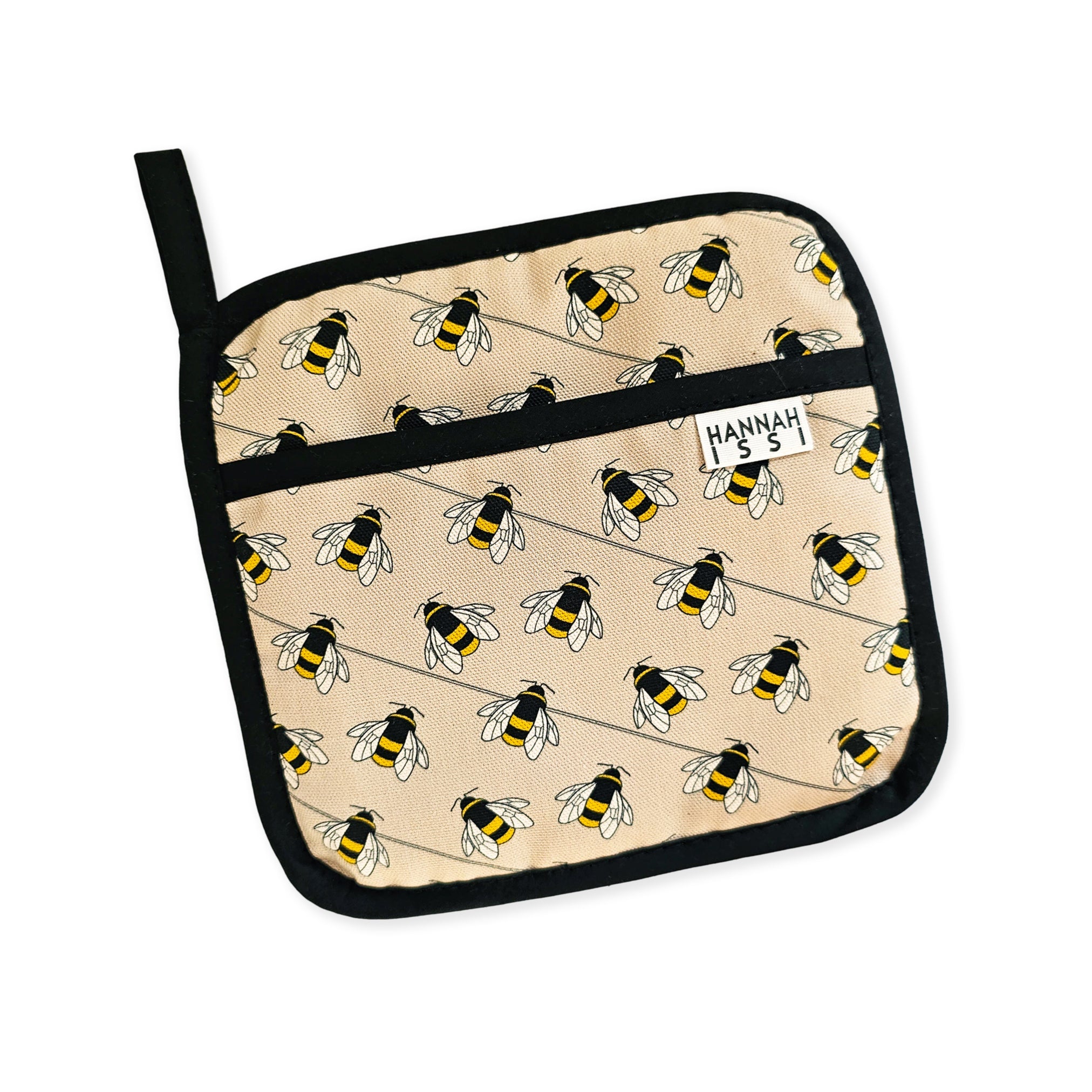 Organic cotton Bee pot grab – heat-safe kitchen handle cover by Hannah Issi, handmade in the UK. Stylish and functional.