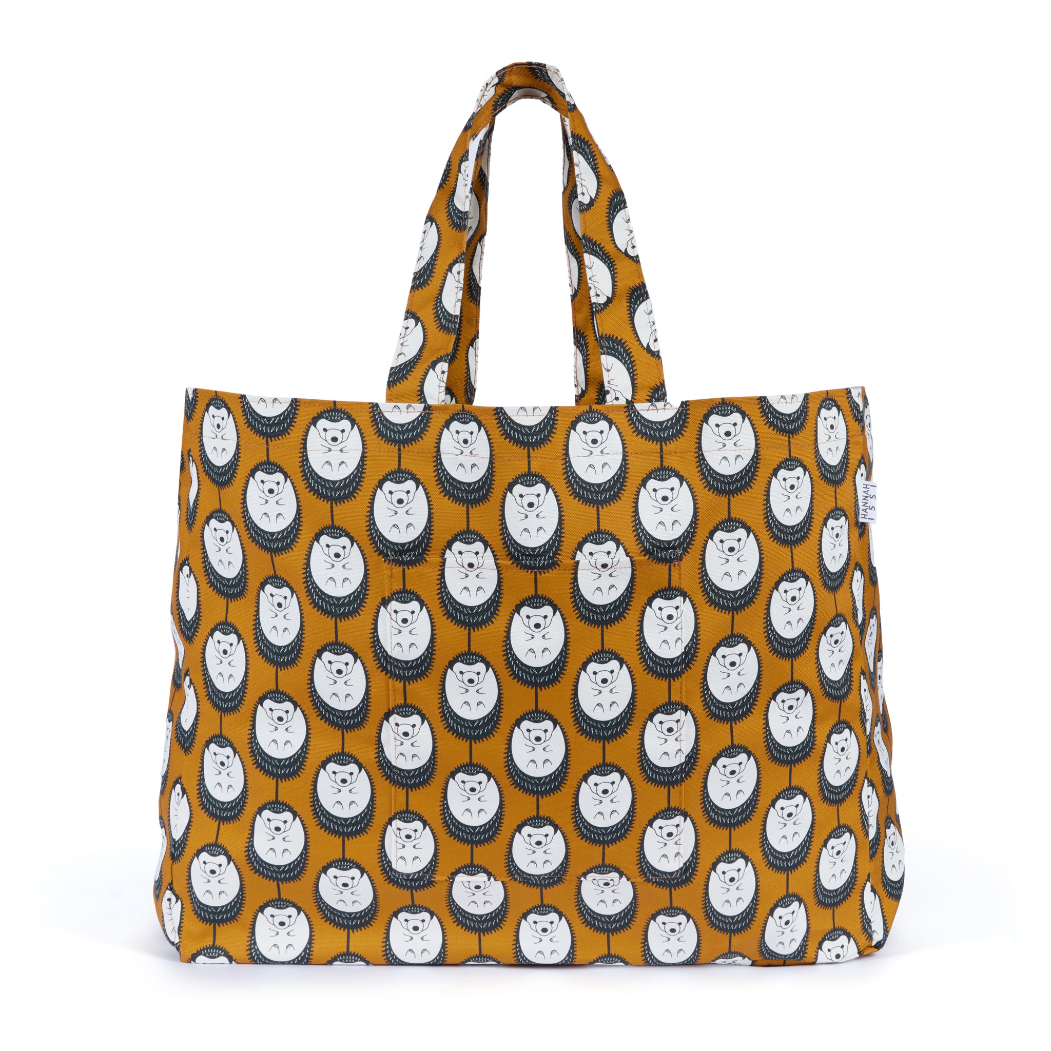 Organic cotton Brown & White Hedgehog oversized shoulder bag – large, roomy design handmade in the UK by Hannah Issi. Stylish and sustainable. Cut -out image with white background.