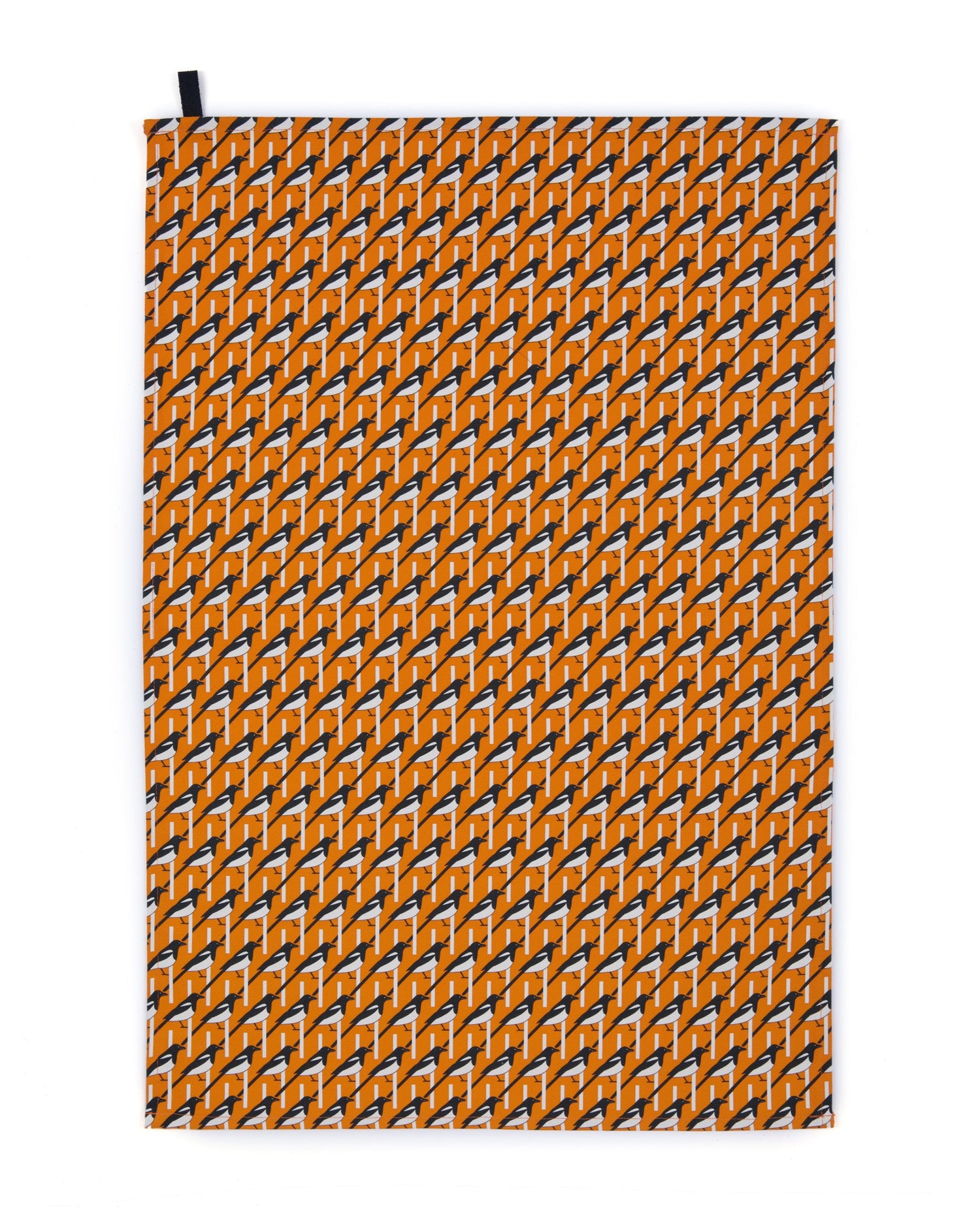 Organic cotton orange magpie tea towel – designed by Hannah Issi and handmade in the UK. Stylish, sustainable kitchen linen. Cut-out image shown with white background.